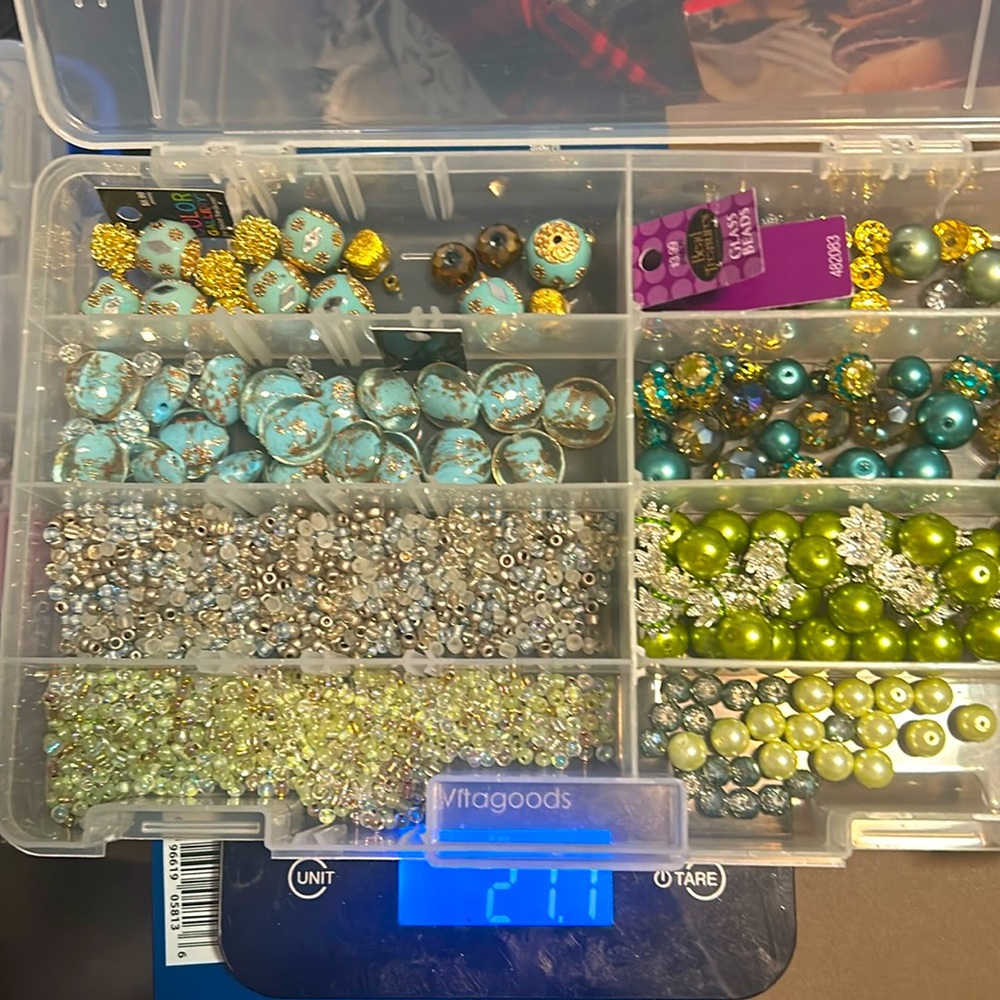 27 oz of misc beads. DIY crafting.